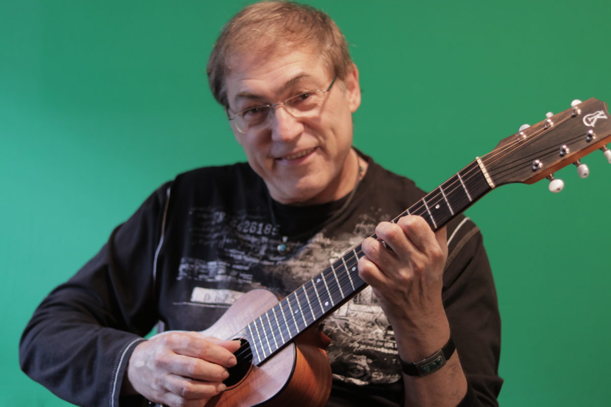Don Alder plays a Kanile`a